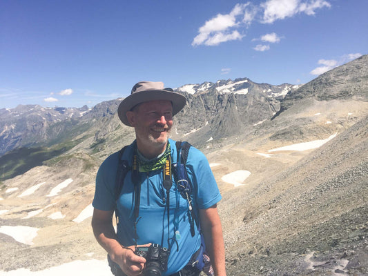 Picture of Andrew Jones, photographer,  with a mountain backdrop